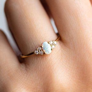 Opal and diamond ring